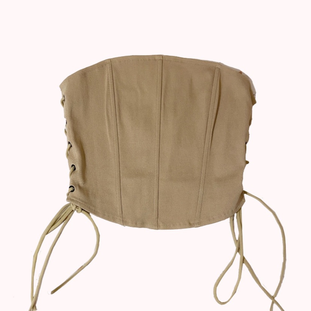 Tan corset with lace up sides